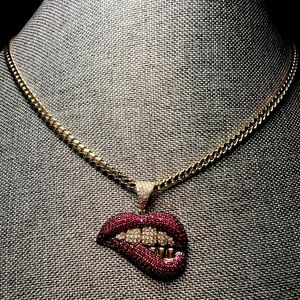 cz 10k gold lip pendant